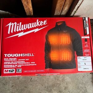 Milwaukee heated jacket, large, black, batter and charger included.
